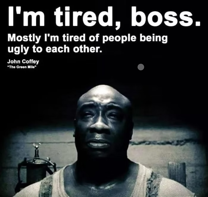 Emotional scene from The Green Mile featuring John Coffey saying “I’m tired, boss,” highlighting exhaustion and the impact of cruelty in a harsh world.